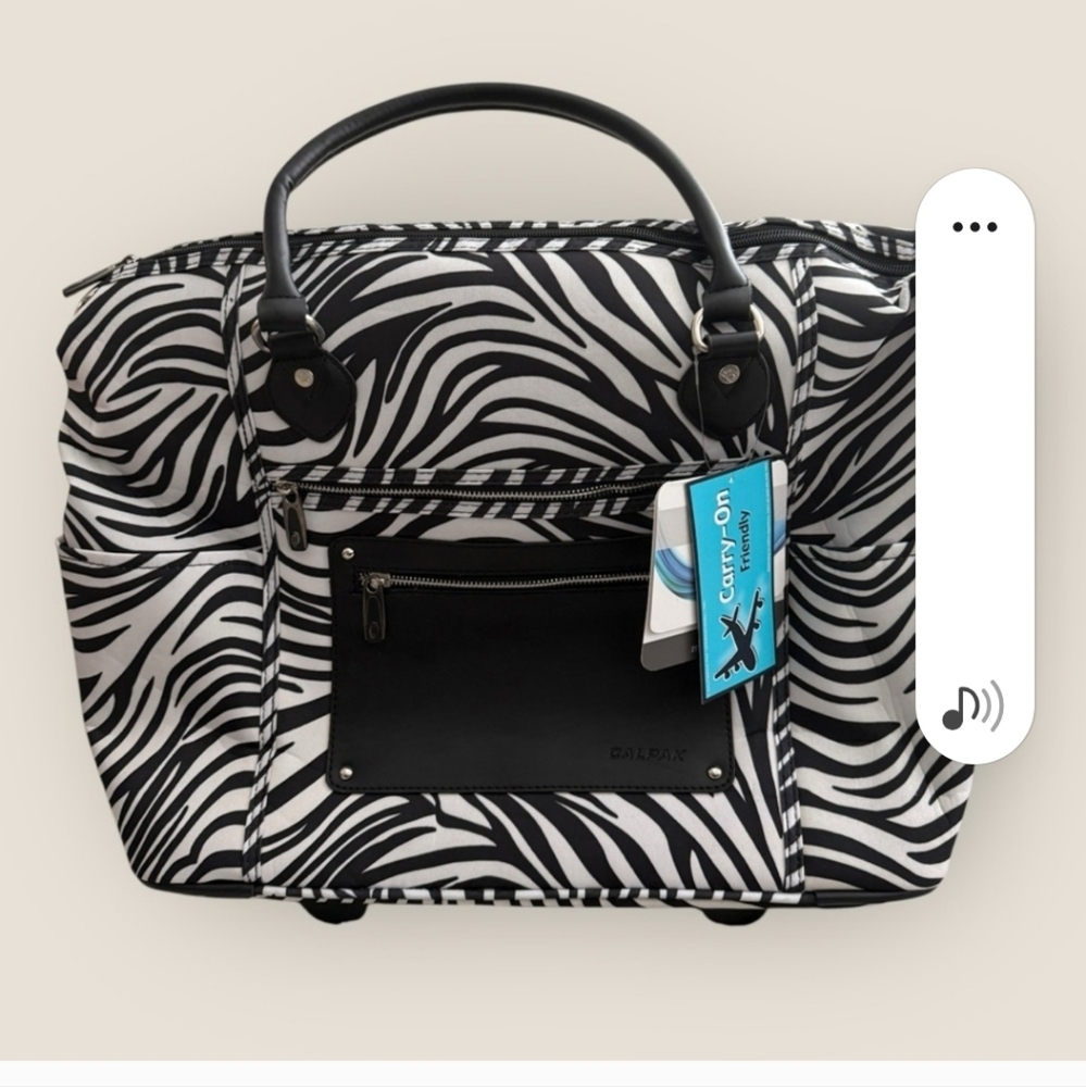 Calpak | Zanny Rolling Carry-On Tote | Zebra Print with Purple Interior | 21 in